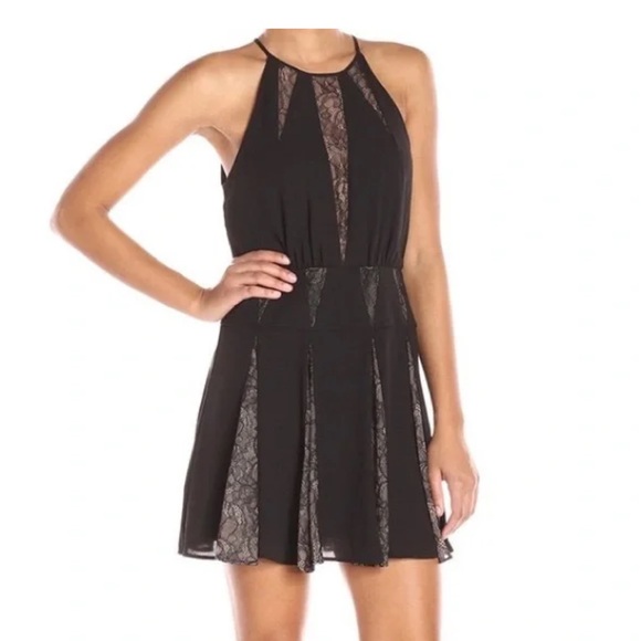 BCBGMaxAzria Dresses & Skirts - BCBGMaxAzria Black Lace Panel Mini Dress size 8